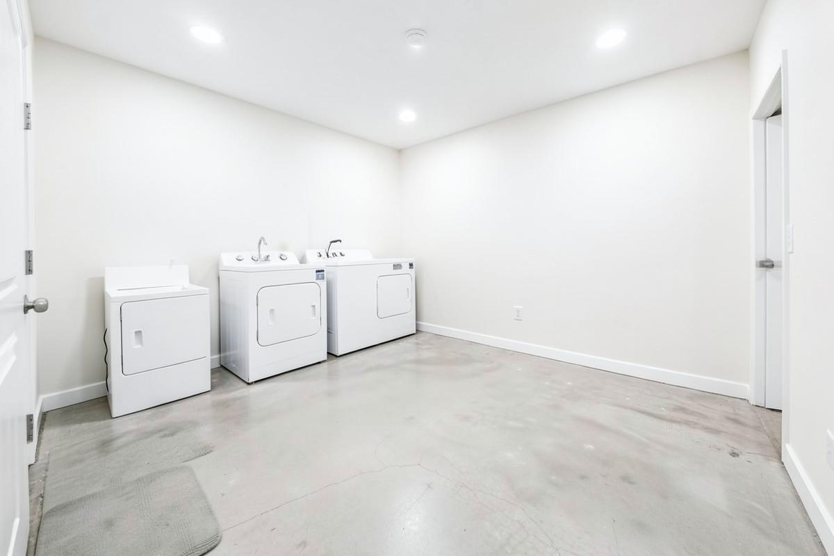 A fully sanitized and dried basement laundry area after sewage cleanup